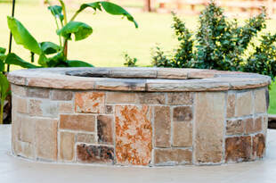 Outdoor fire pit made of flagstone